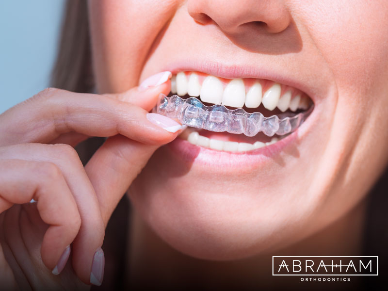 Invisalign vs. Braces: Which Is Better? - Abraham Orthodontics